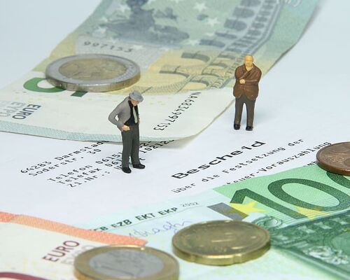tax-office-tax-assessment-miniature-figures-money